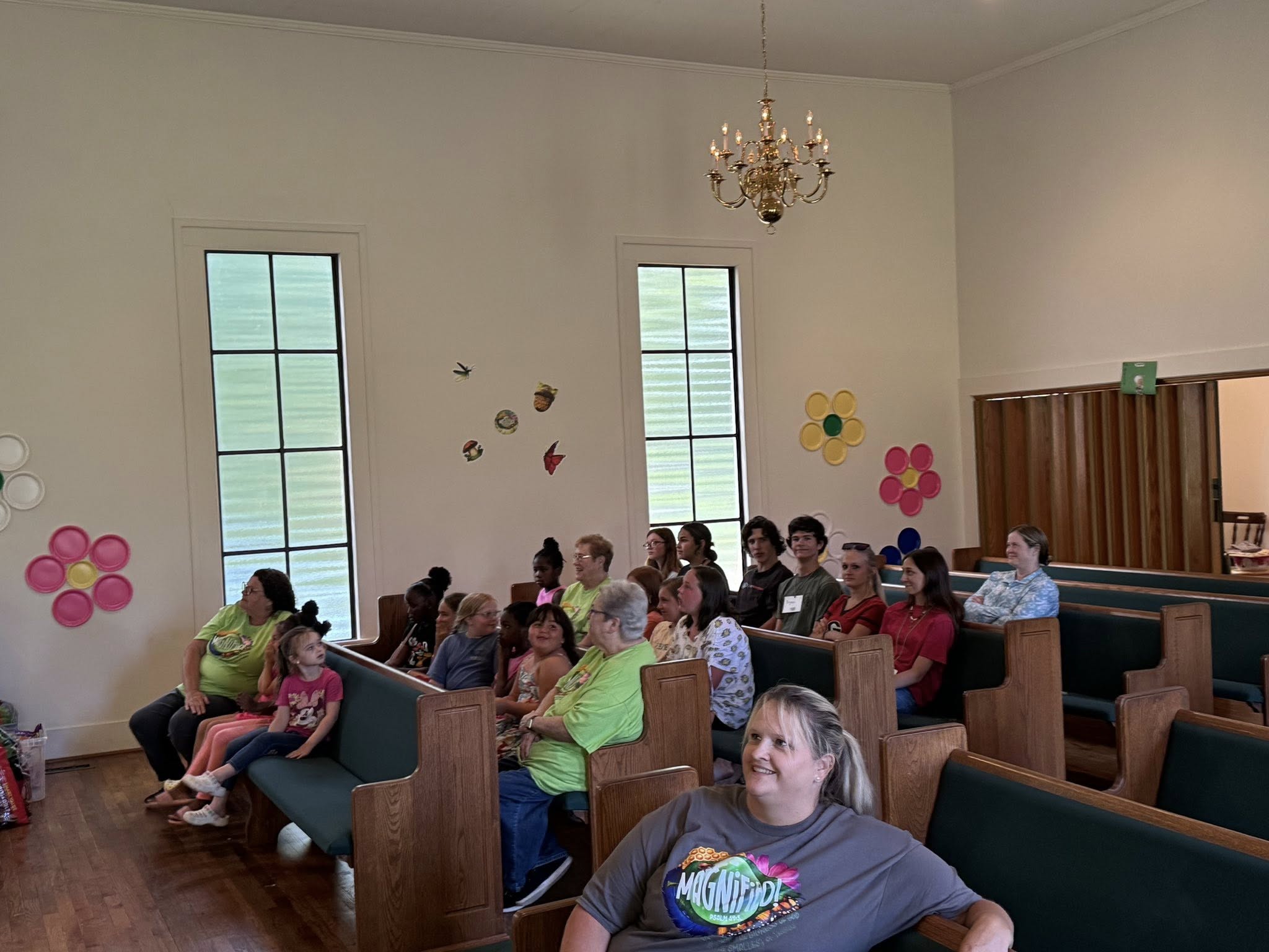 Kids and leaders during VBS 2025 inside the sanctuary.